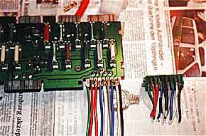 first part of board modification, old melted plug is shown right